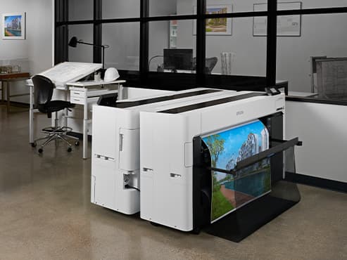 Impresora Epson T-Series imprimiendo planos técnicos de ingeniería